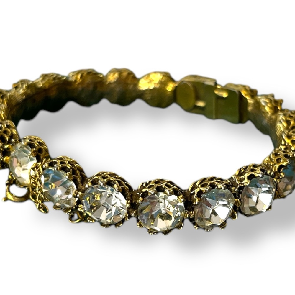 VINTAGE Signed Jeanne Clear RHINESTONE Antiqued Goldtone Clamper BANGLE BRACELET